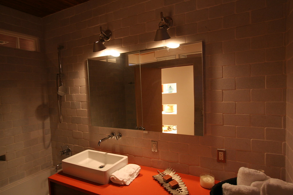 Wall sconce lighting over a bathroom vanity