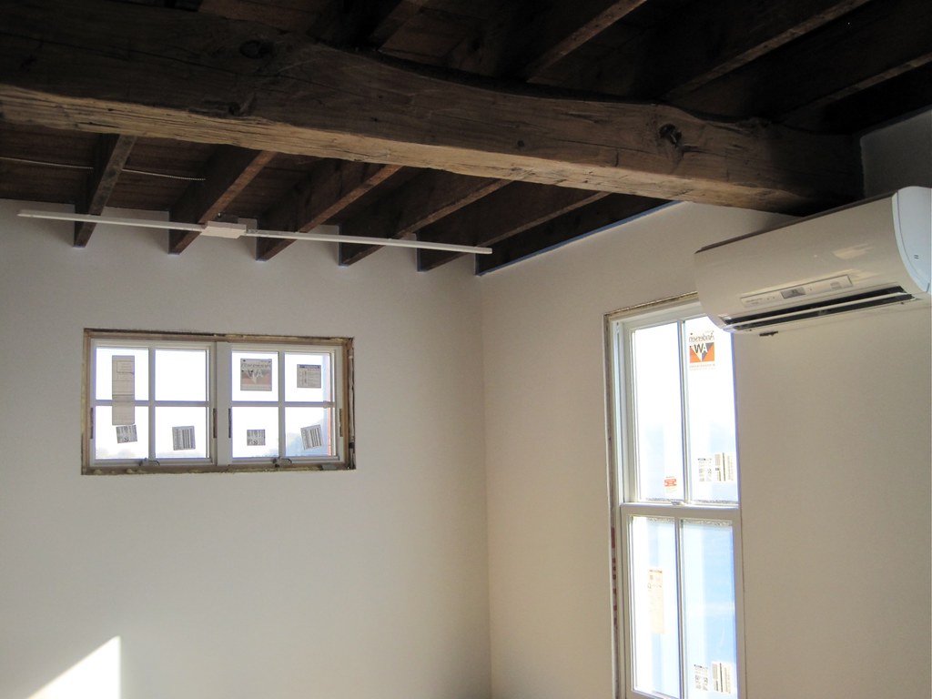 Split system air conditioning unit installed in a home